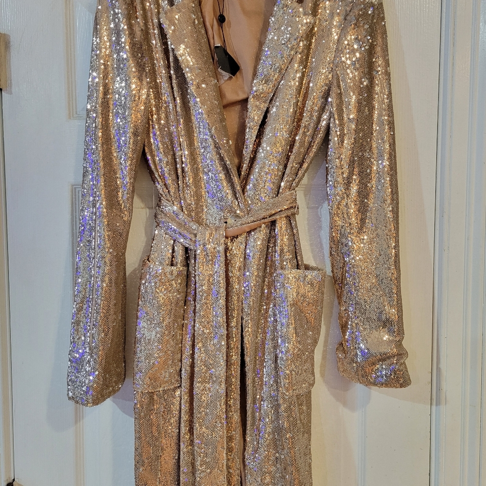 Beautiful  gold jacket new  med.reg.599.00